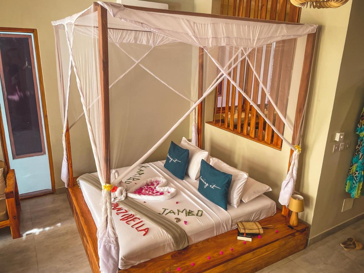 Zanzibella Hotel & Spa Kiwengwa  Exterior foto A bed with a mosquito net
