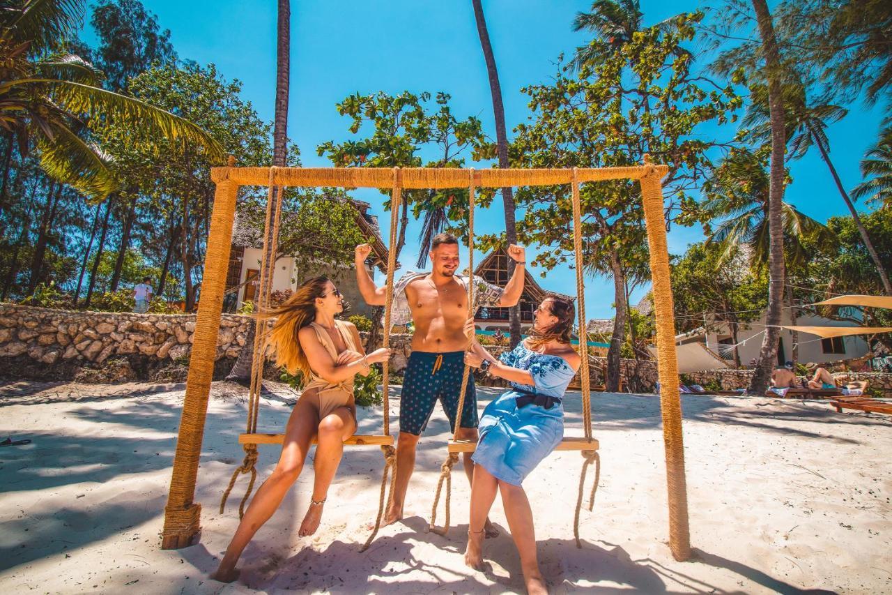 Zanzibella Hotel & Spa Kiwengwa  Exterior foto Swinging at the beach